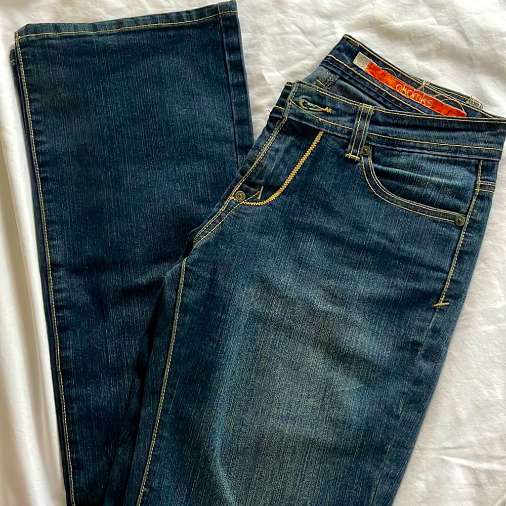 Wide legged/ flared dark blue jeans